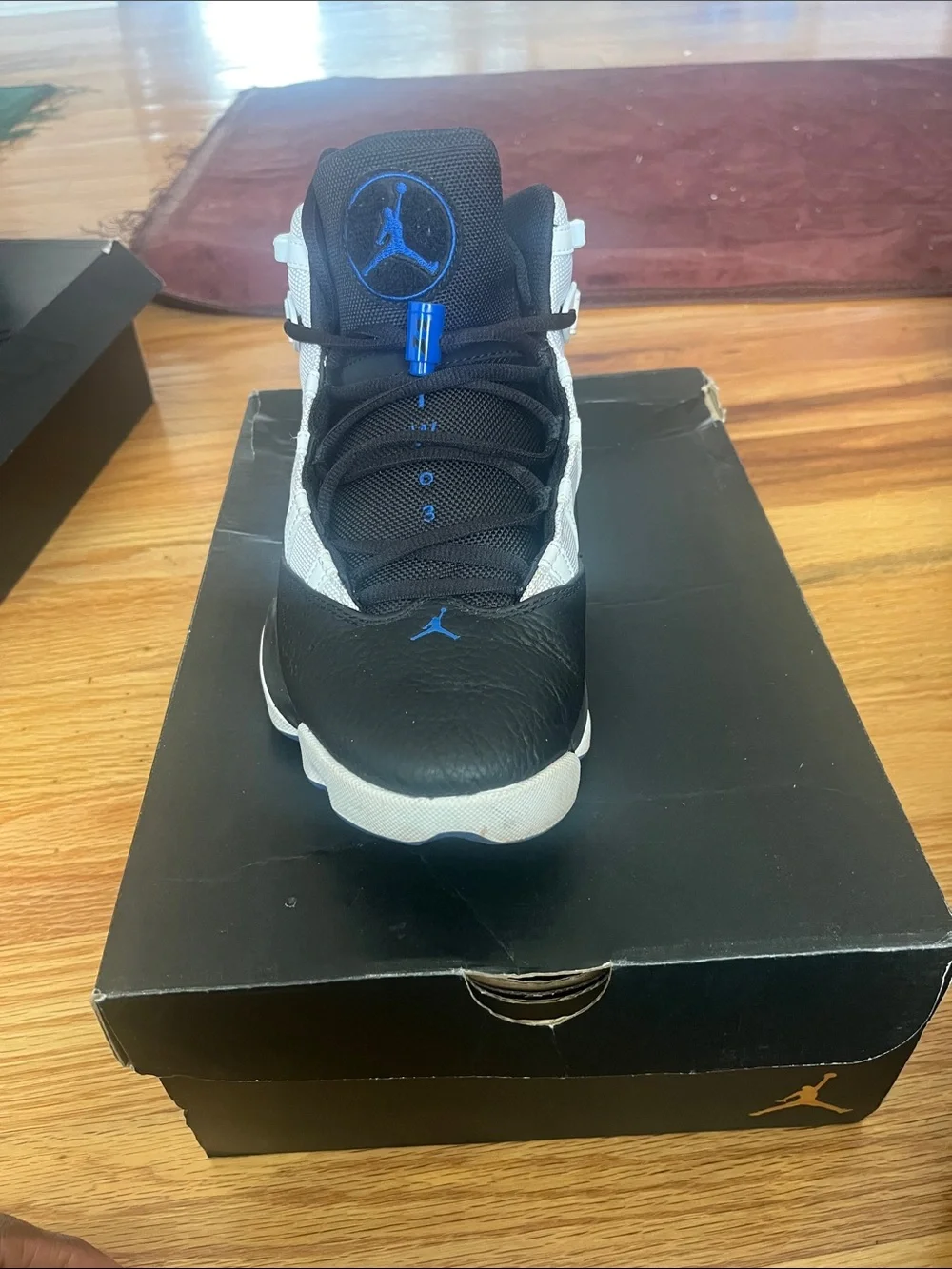 Jordan Retro High-Top Sneakers in Black, White & Blue